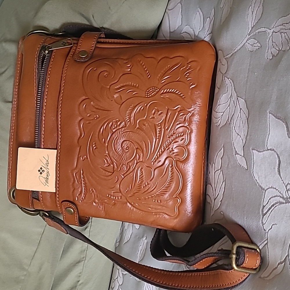 Patricia Nash  cross body brown bag 9 X 10 with adjustable strap.wallet included